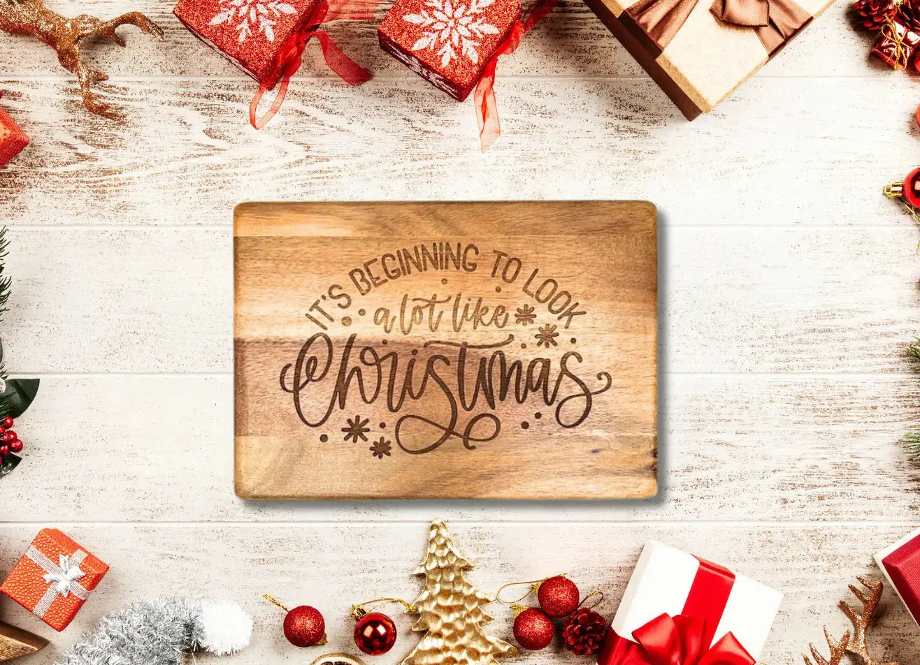It's beginning to look a lot like Christmas engraved charcuterie board Lynn & Liana Designs