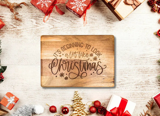 It's beginning to look a lot like Christmas engraved charcuterie board Lynn & Liana Designs