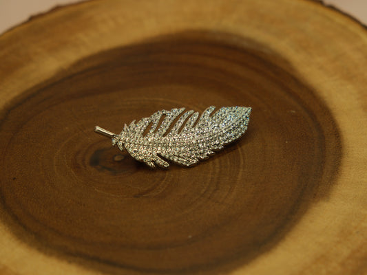 Crystal feather brooch