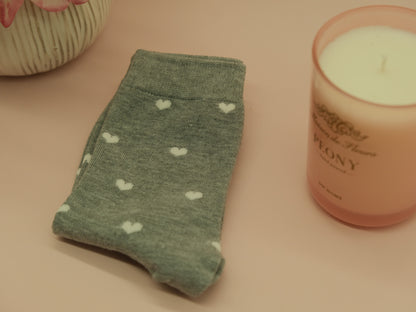 Light grey socks with white hearts