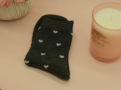 Black socks with white hearts